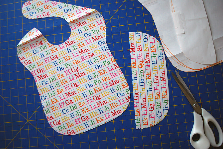 Cutting out DIY toddler bib with pocket