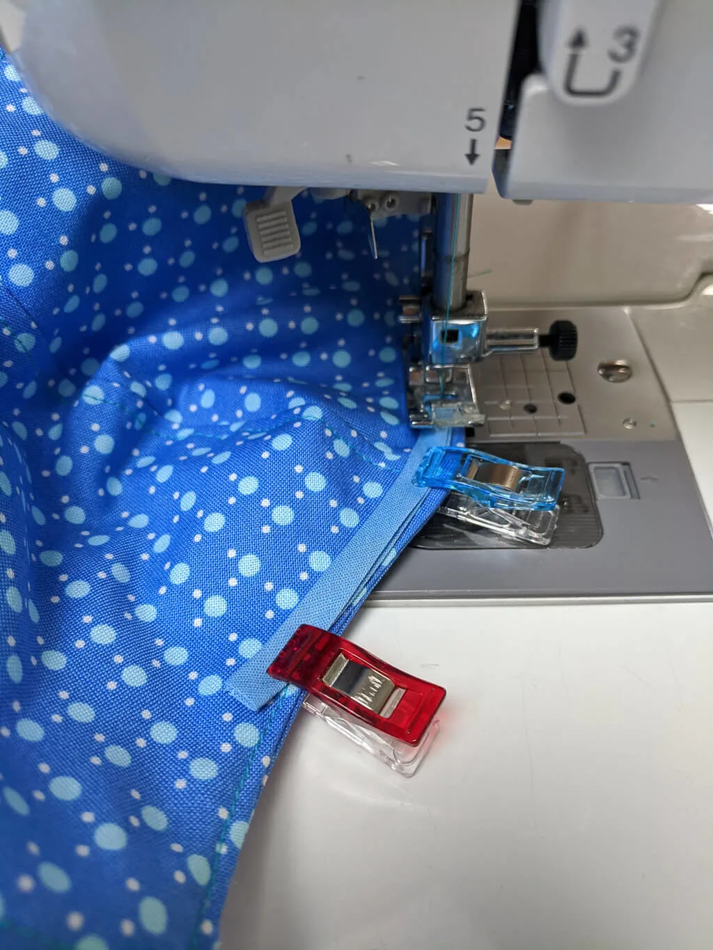 Sewing bias tape onto a DIY fabric face mask
