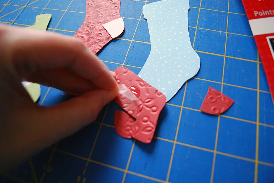 Stockings decoration on food storage container lids for pot lucks and cookie exchanges