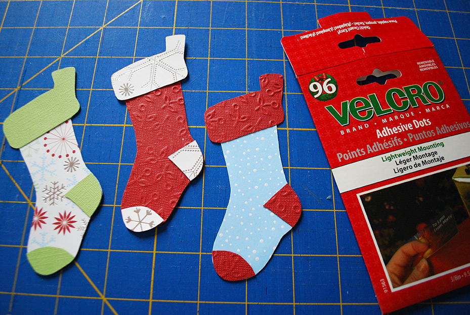 Stockings decoration on food storage container lids for pot lucks and cookie exchanges