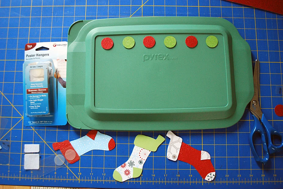 Stockings decoration on food storage container lids for pot lucks and cookie exchanges