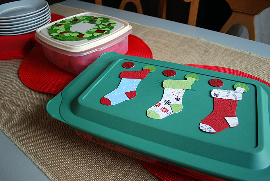 Festive stockings decoration on food storage container lids for