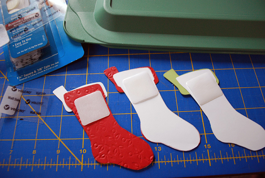 Stockings decoration on food storage container lids for pot lucks and cookie exchanges