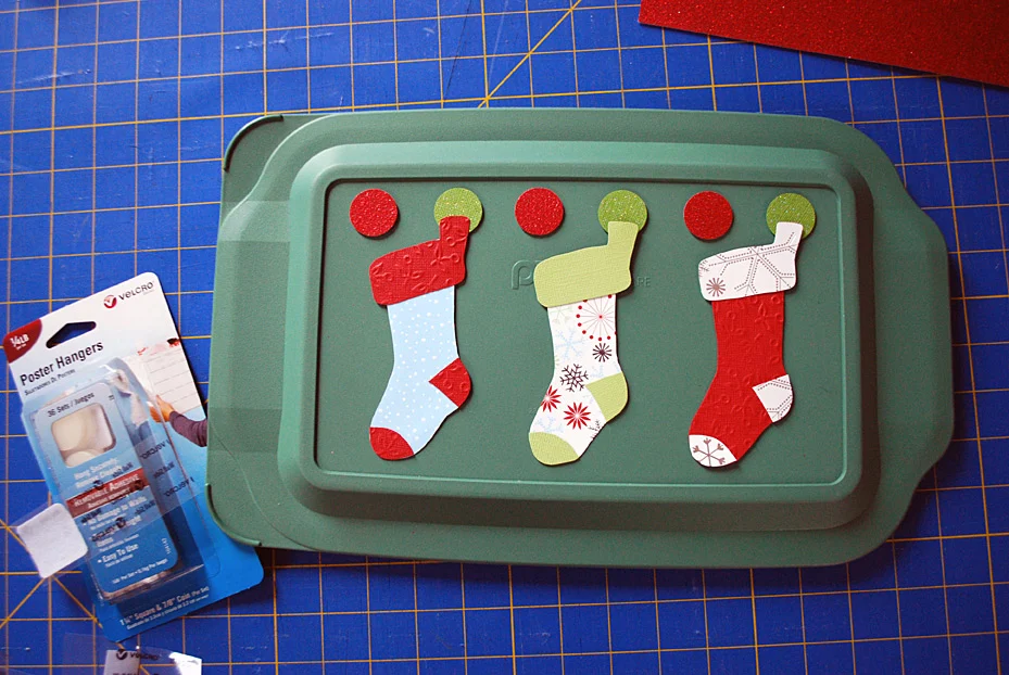 Stockings decoration on food storage container lids for pot lucks and cookie exchanges