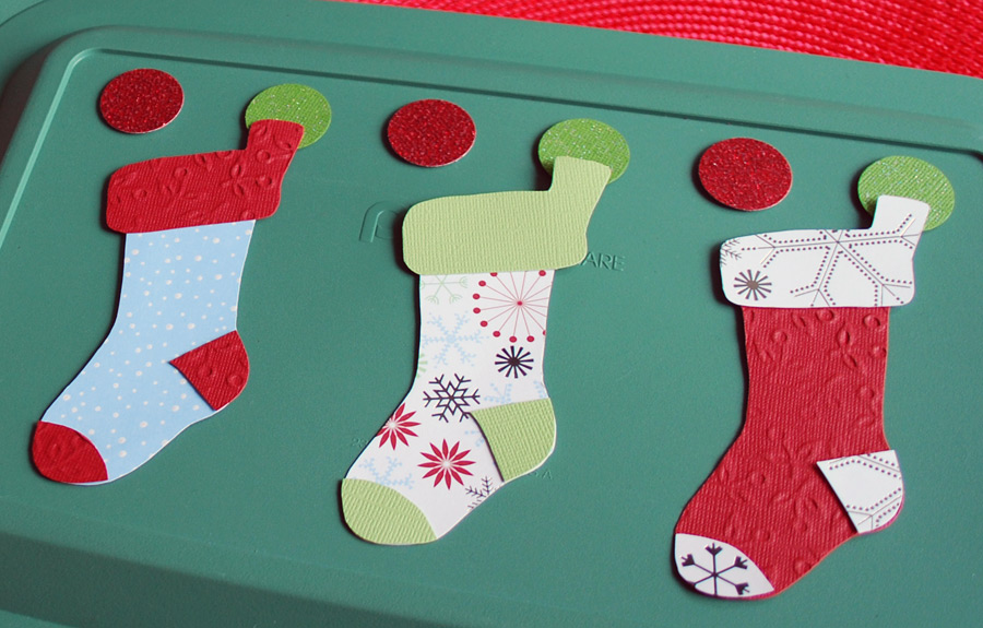 Stockings decoration on food storage container lids for pot lucks and cookie exchanges