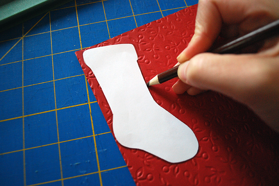 Stockings decoration on food storage container lids for pot lucks and cookie exchanges