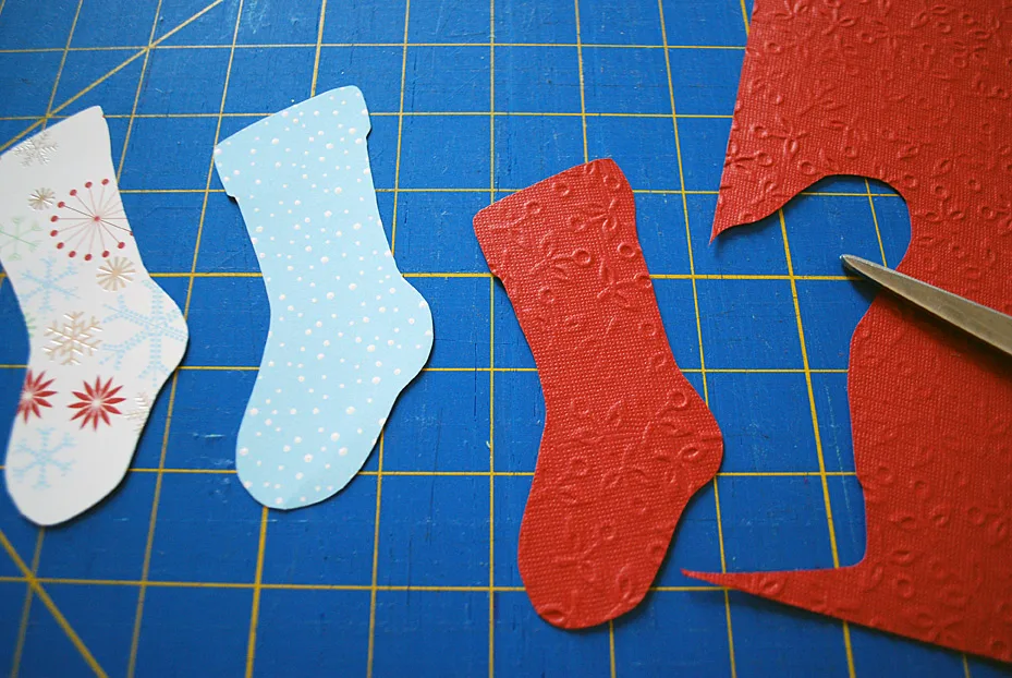 Stockings decoration on food storage container lids for pot lucks and cookie exchanges