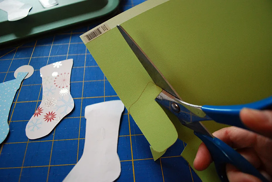 Stockings decoration on food storage container lids for pot lucks and cookie exchanges