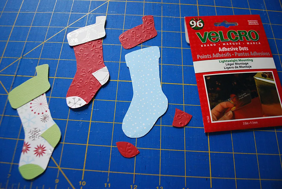 Stockings decoration on food storage container lids for pot lucks and cookie exchanges