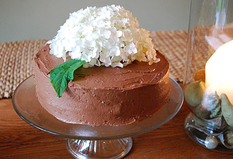 Merriment :: Flower-Topped Birthday Cake With Chocolate Icing
