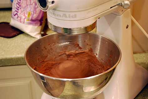 Merriment :: Flower-Topped Birthday Cake With Chocolate Icing