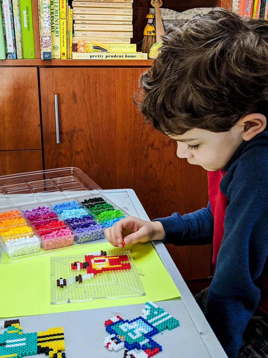 Liam making perler beads - copyright Kathy Beymer