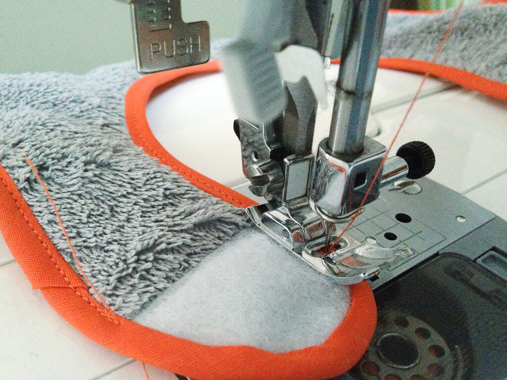 DIY free baby bib sewing pattern - how to sew bias tape around VELCRO Brand fasteners
