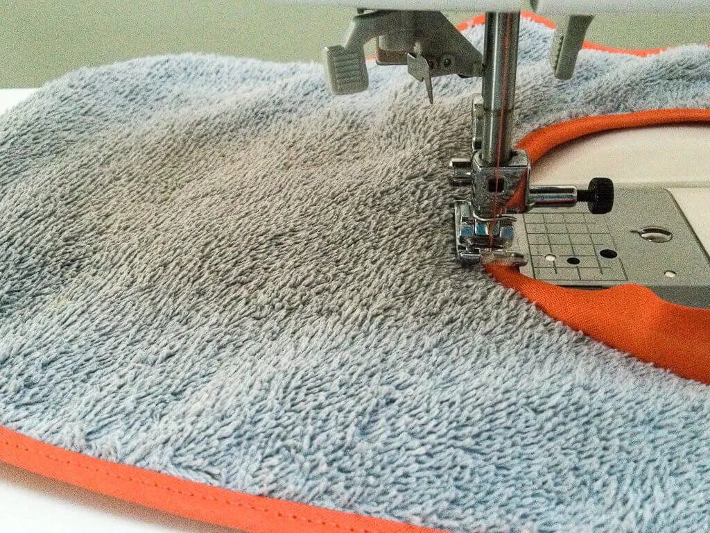 DIY free baby bib sewing pattern - how to sew bias tape around a baby bib