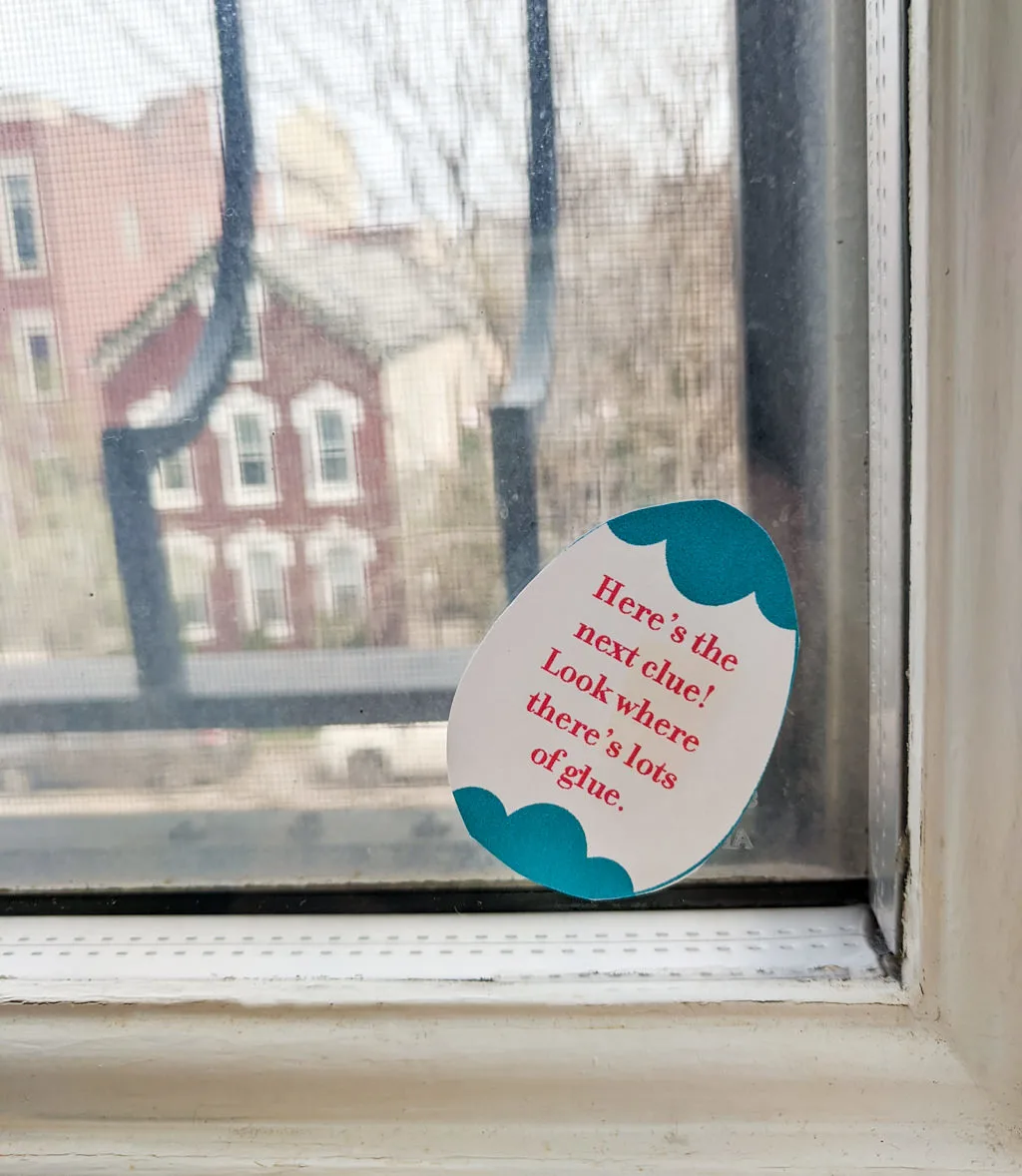 Easter indoor scavenger hunt clue hidden on a window