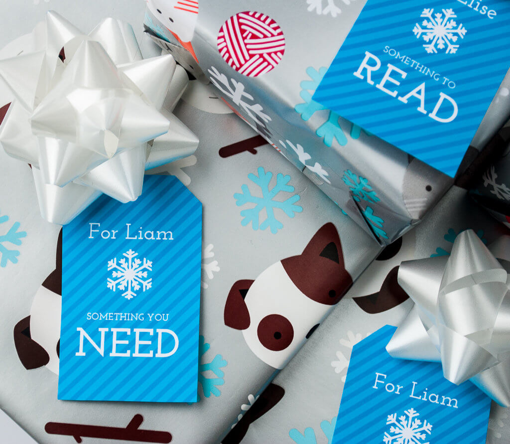 Four Gift Christmas: Want, Need, Make, Read (or Want, Need, Wear, Read). Free printable Four Gift Christmas gift tags in blue. Download the free printable Christmas gift tags, type to personalize, and print! #christmas #christmasgifts #giftwrapping #gifttags #freeprintable #printable