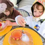 Fun kids Halloween party game: Eyeball surprise! Freeze glow-in-the-dark eyeball bouncy balls in baking soda and water, then spoon on vinegar to reveal.