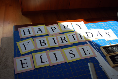 Happy 1st Birthday Banner Free Printable Hanging Sign by Kathy Beymer at Merriment Design