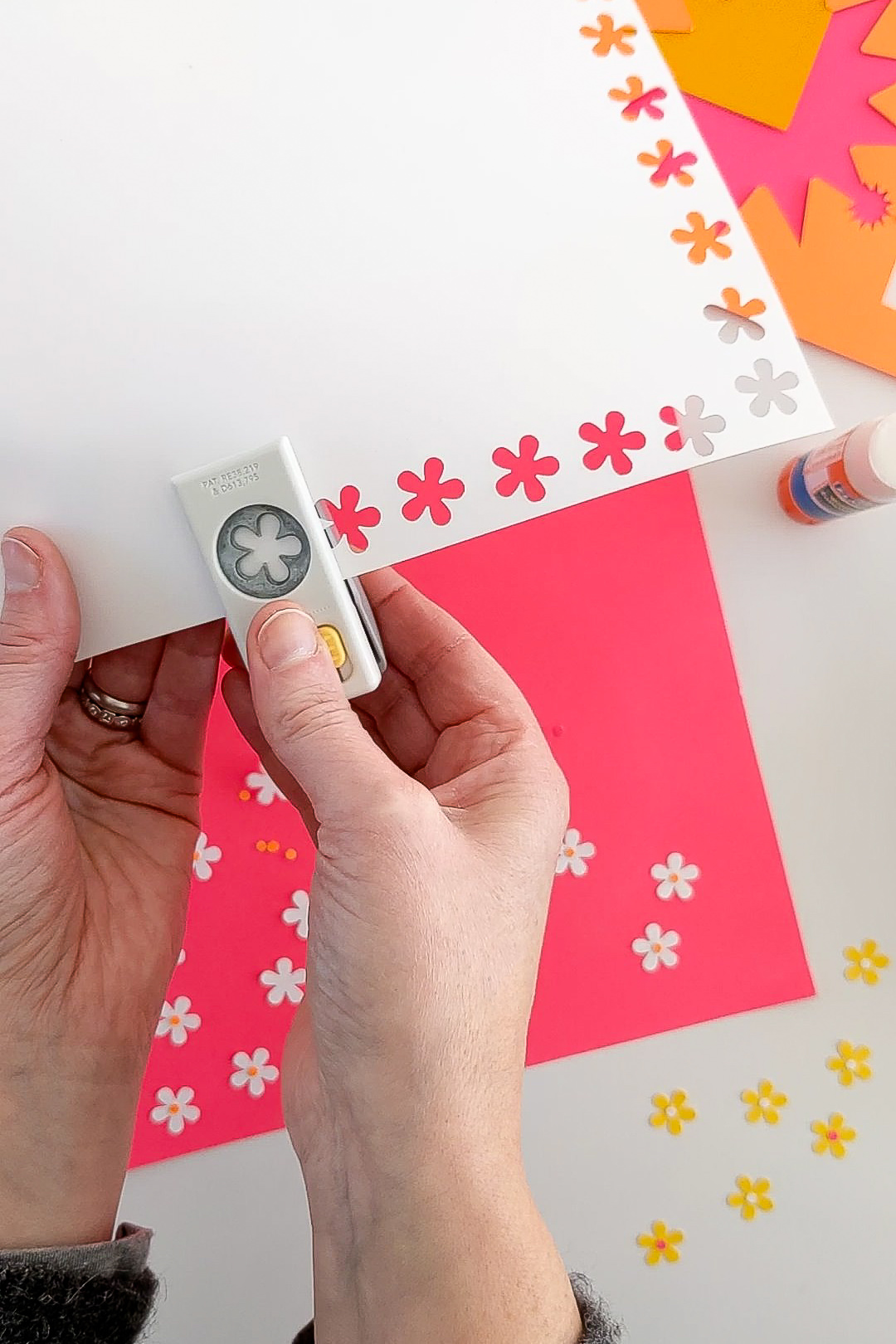Punching paper with a flower craft punch