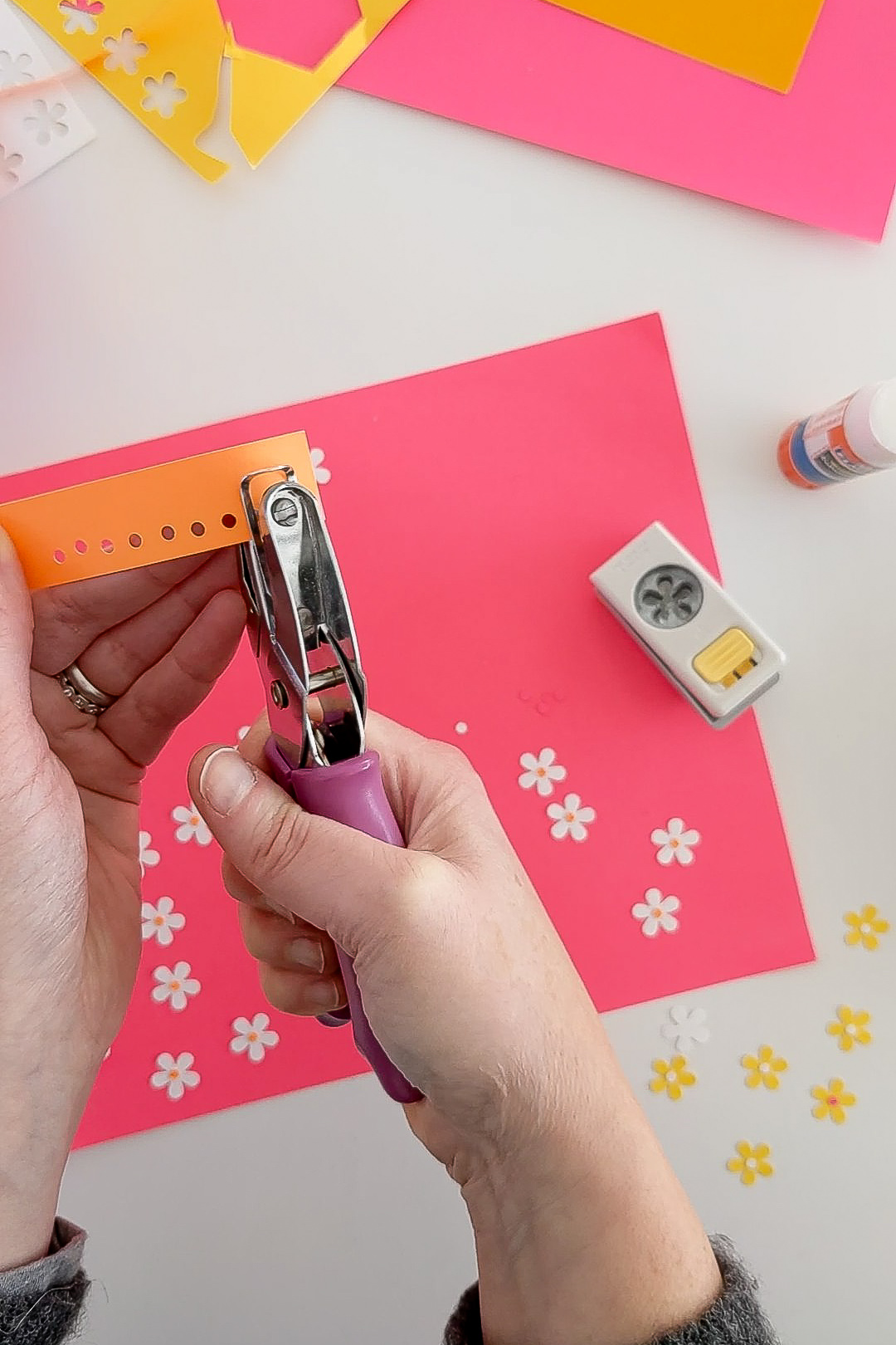 Punching paper with a 1/8 inch hole punch
