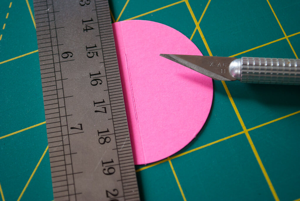 Adding slits to the handle of a paper Easter basket