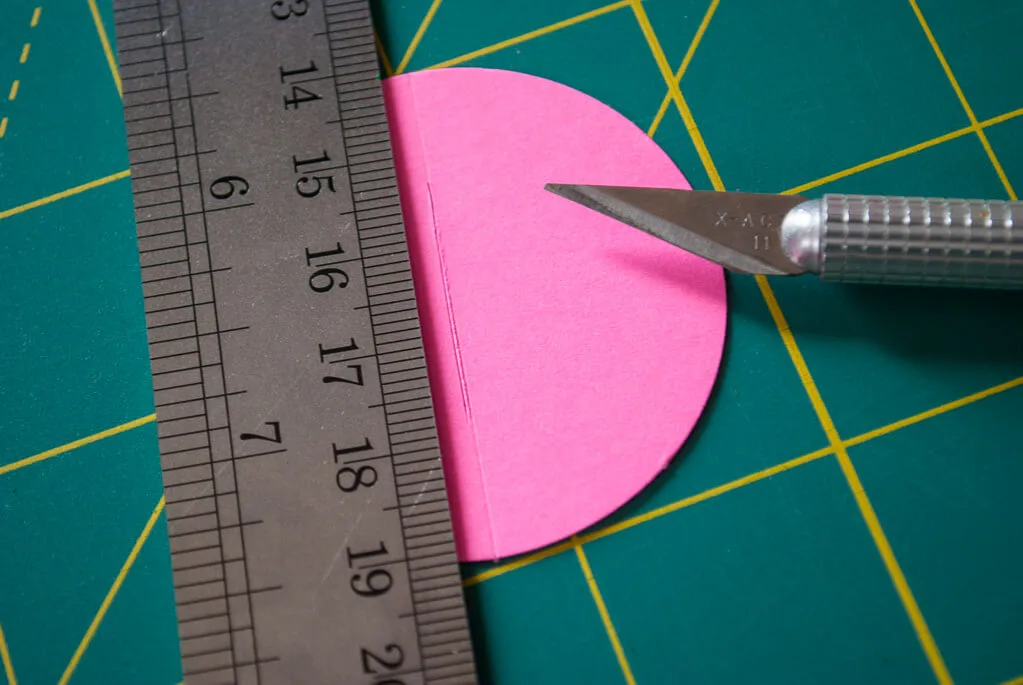 Adding slits to the handle of a paper Easter basket