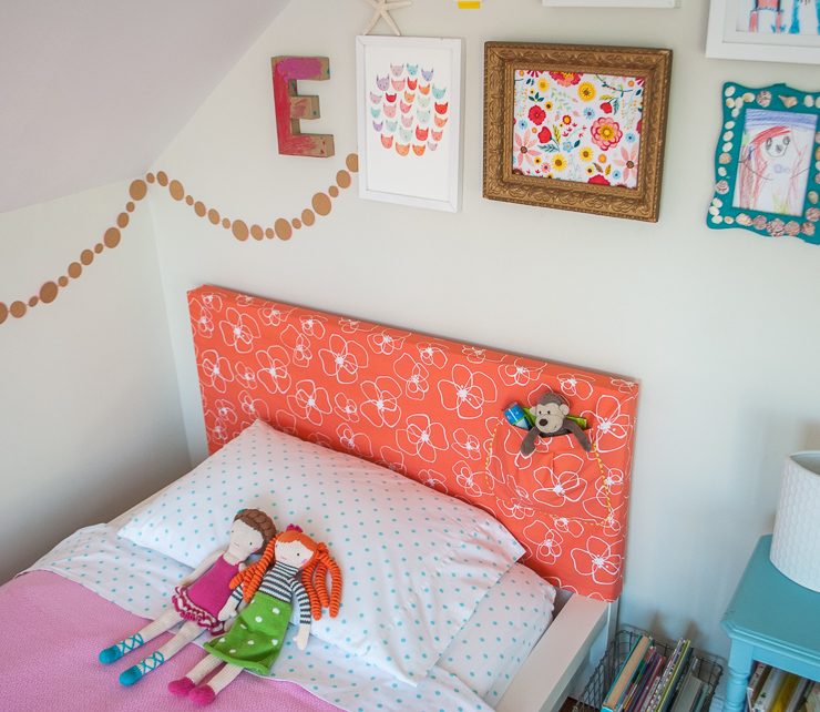 How to make a DIY headboard slipcover with a super cute storage pocket. What a cute way to temporarily update a bedroom! You can hack an IKEA Malm bed or make the slipcover for your own headboard!