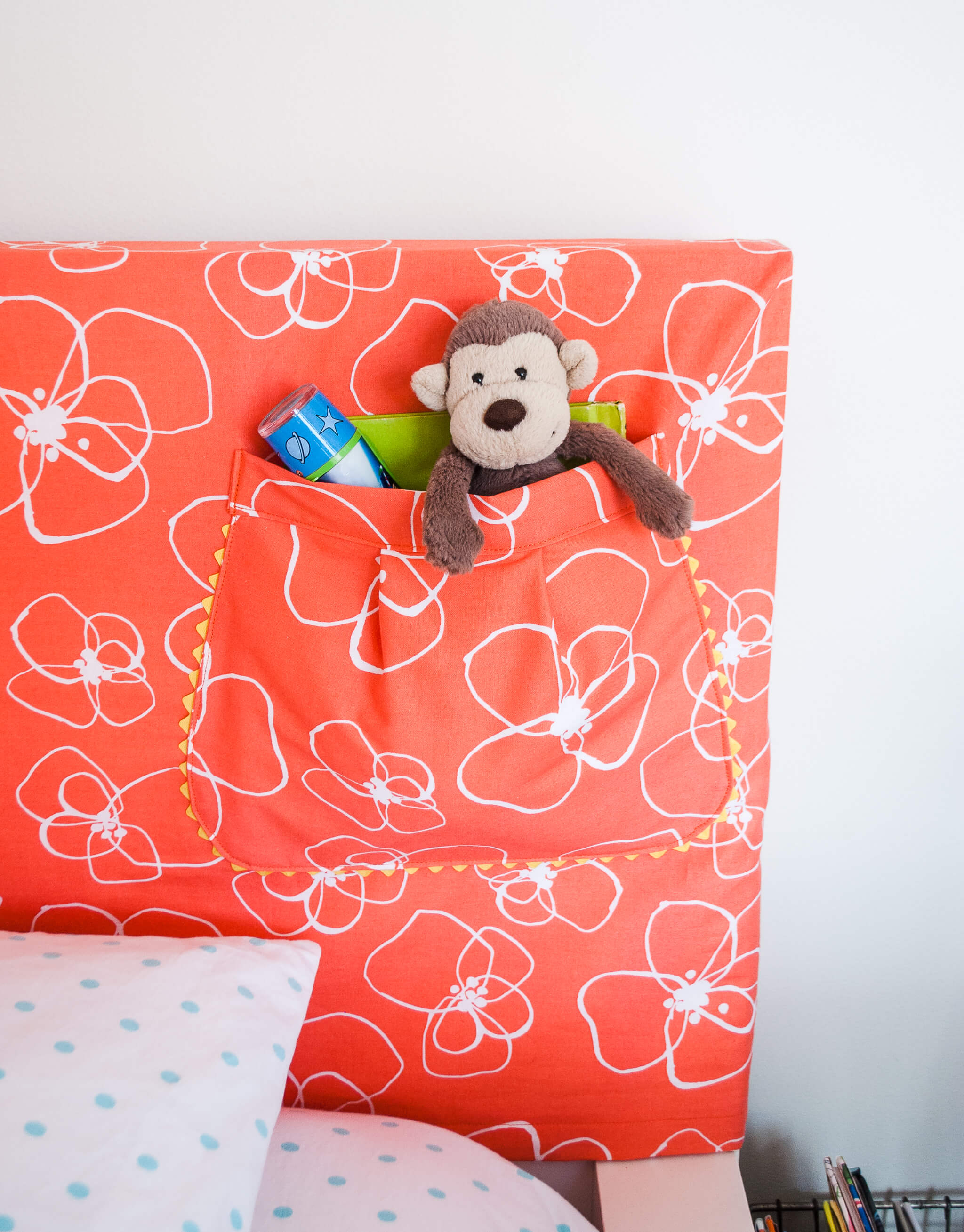 DIY headboard slipcover for kids with storage pocket