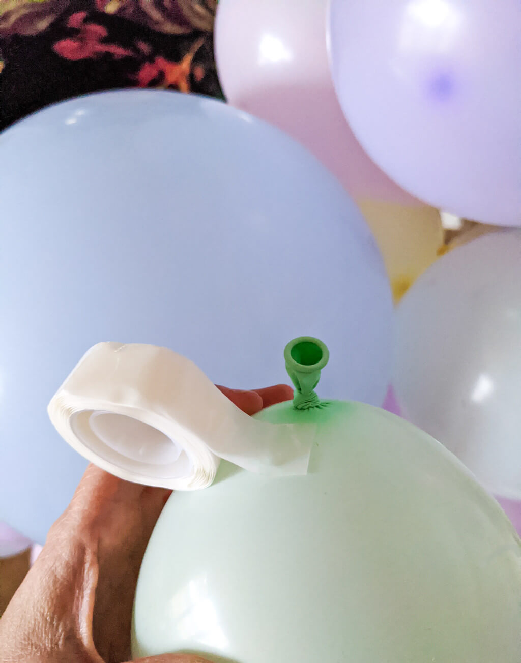 Glue dots on balloons to make a balloon garland