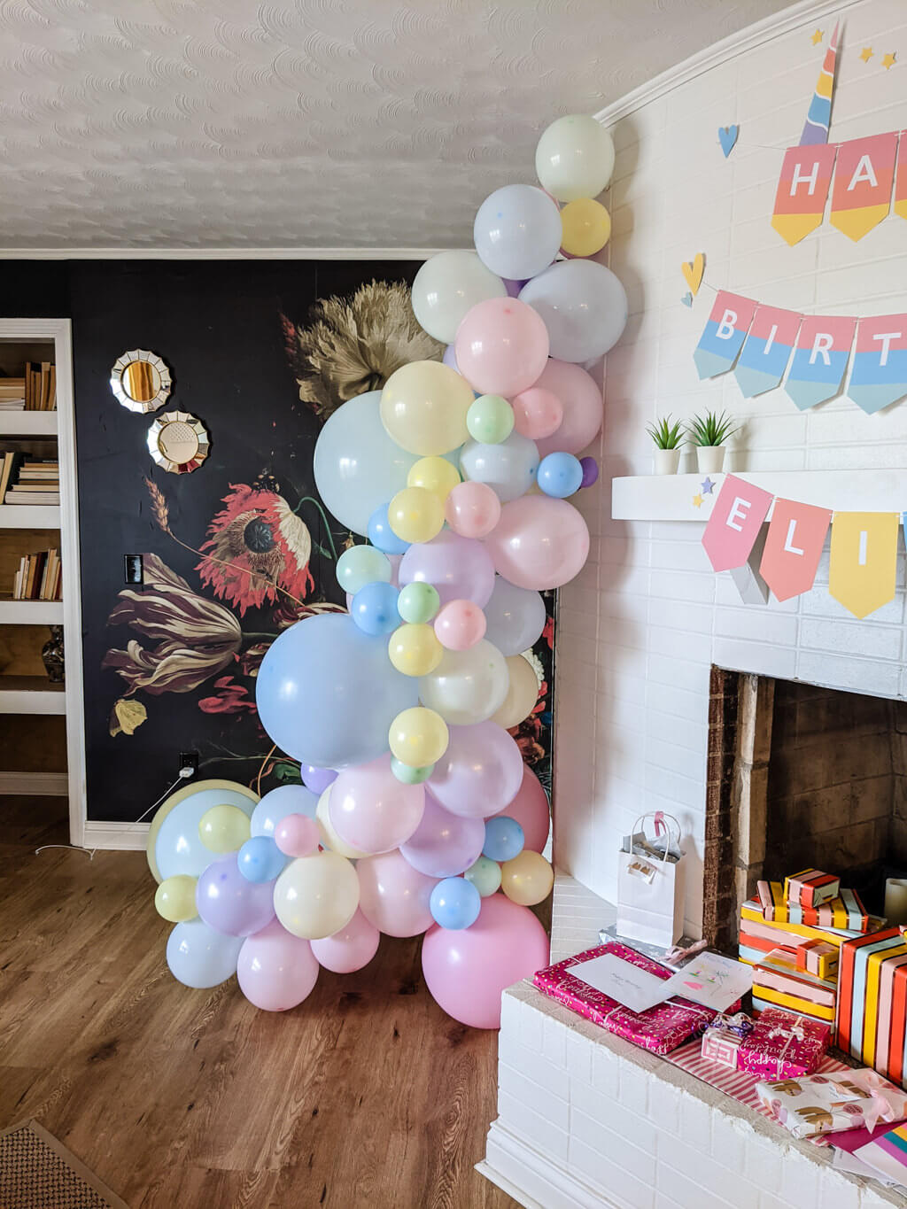 Balloon garland on a wall birthday party decor