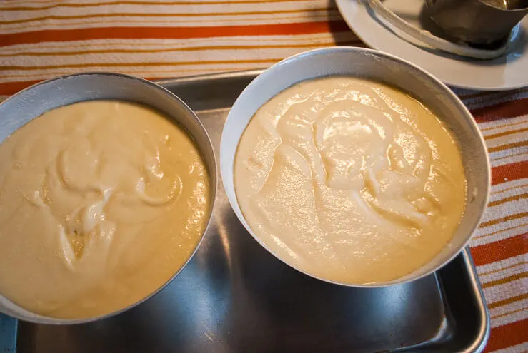 Pouring cake batter into a 3D ball pan