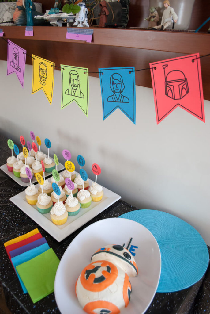 Star Wars cupcakes, BB-8 cake, and birthday banner