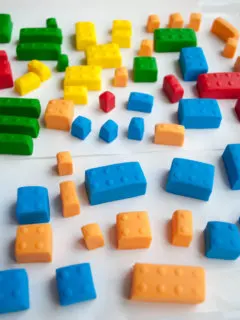 How to make fondant LEGO bricks for a LEGO birthday cake. Making fondant LEGOs is easy and fun, even for beginner cake decorators. #legobirthday #cakes #birthdaycake #legocake #legos #legobirthdayideas