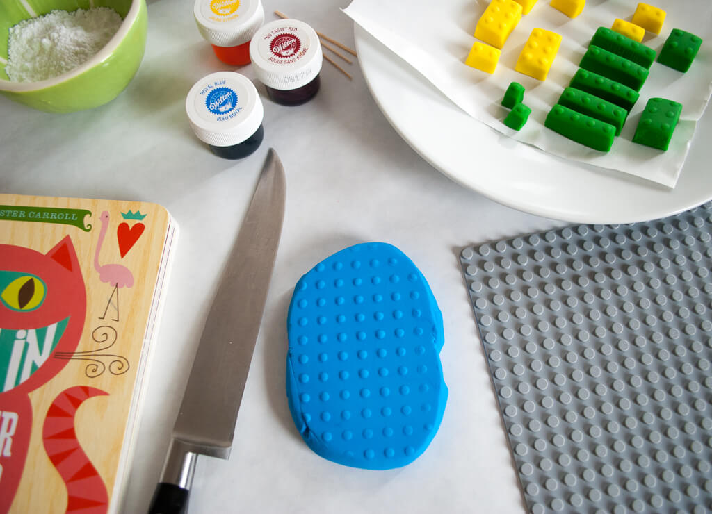 How to make fondant LEGO bricks for a LEGO birthday cake. Making fondant LEGOs is easy and fun, even for beginner cake decorators. #legobirthday #cakes #birthdaycake #legocake #legos #legobirthdayideas