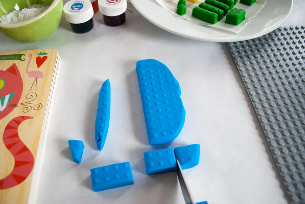 How to make fondant LEGO bricks for a LEGO birthday cake. Making fondant LEGOs is easy and fun, even for beginner cake decorators. #legobirthday #cakes #birthdaycake #legocake #legos #legobirthdayideas