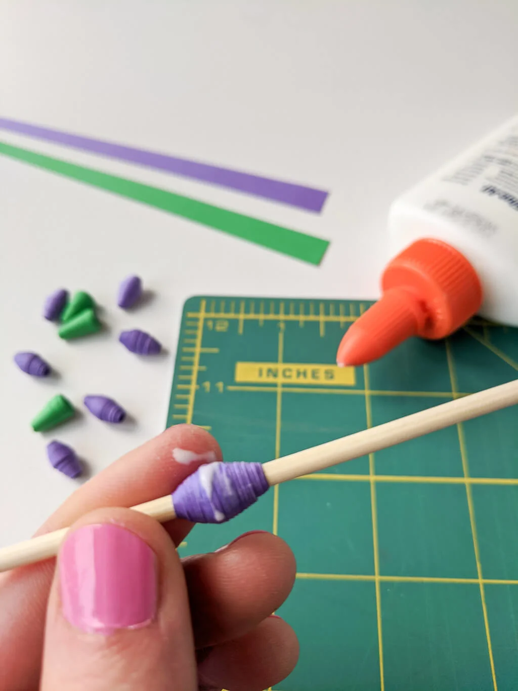 Sealing paper beads with glue and spray sealant