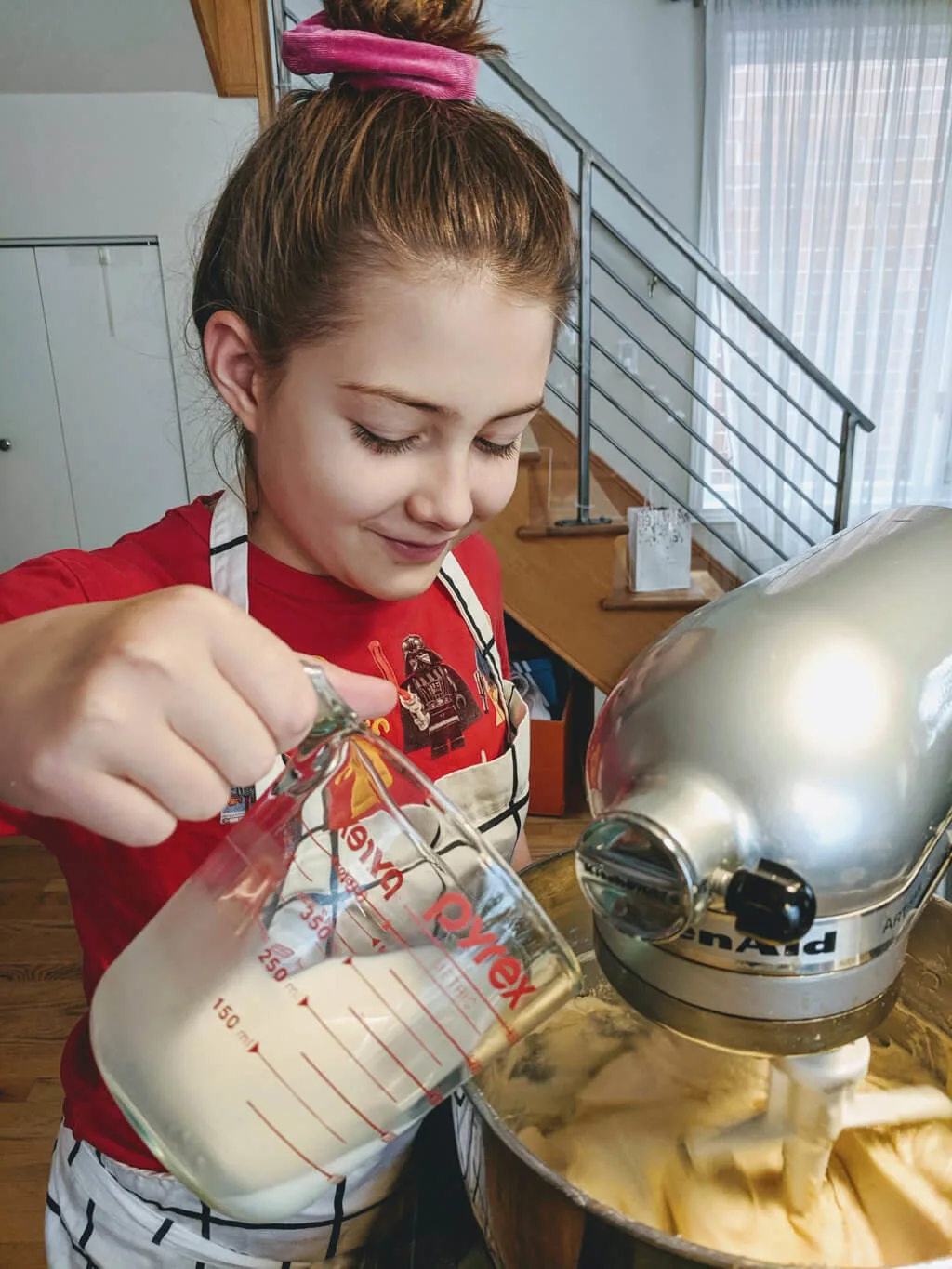 Elise making birthday cake batter