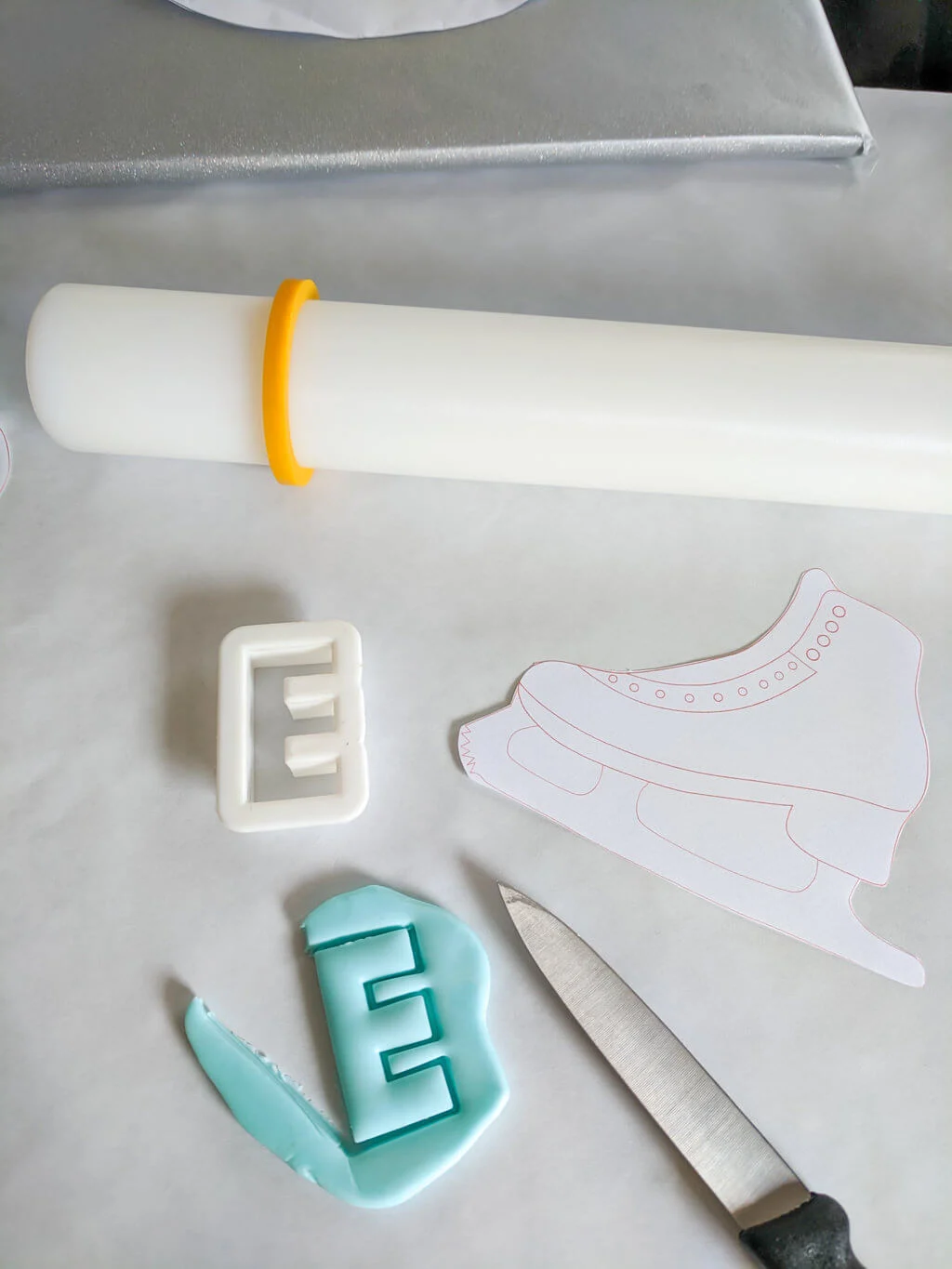 Making fondant letters for ice skate birthday cake