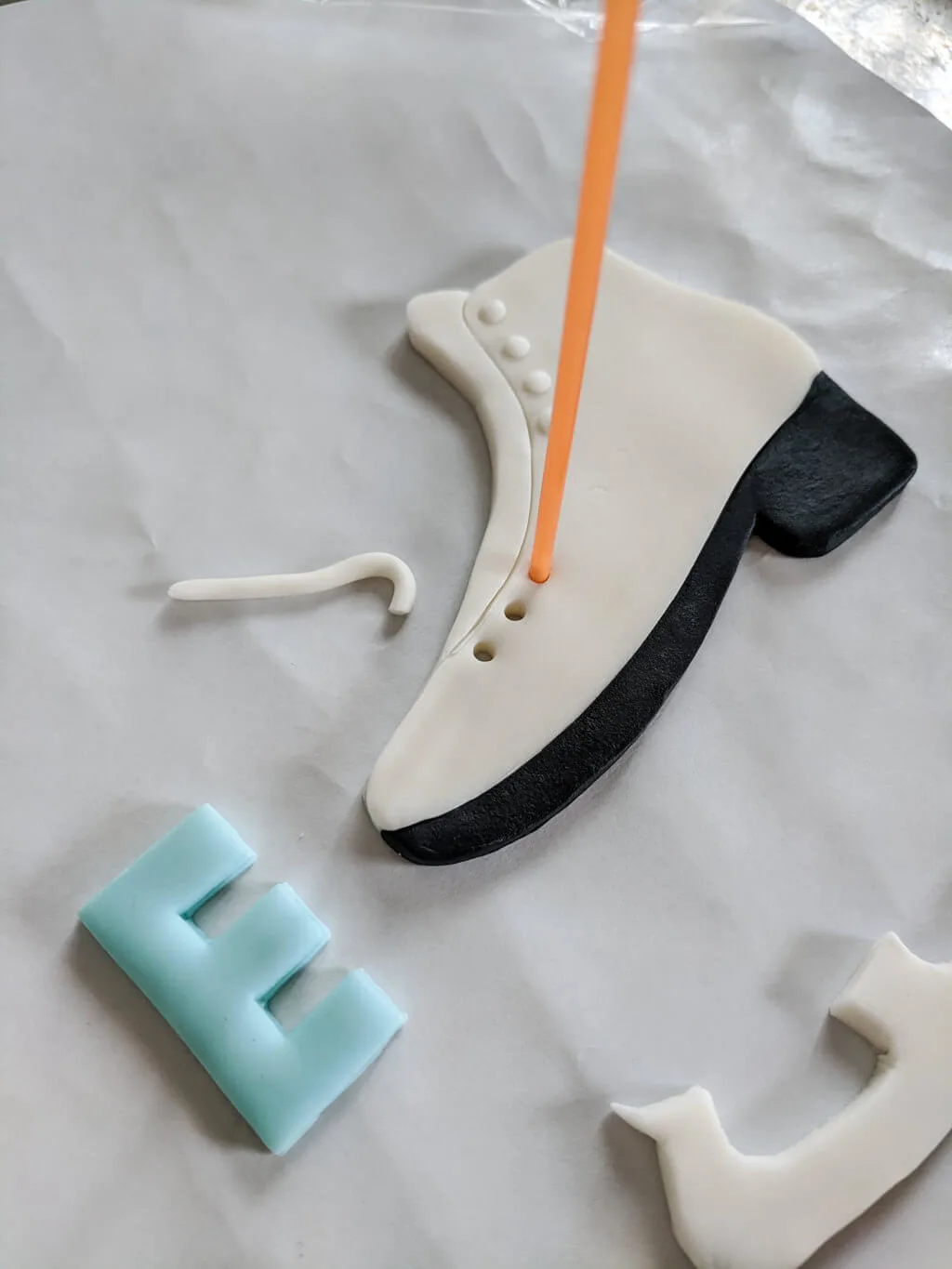 Making a fondant ice skate cake topper