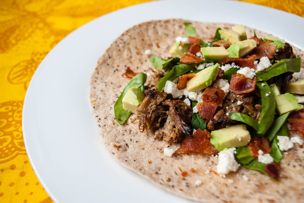 Kid-friendly pork carnitas recipe for easy pork tacos. Make my take on Antique Taco's famous pork tacos at home in your slow cooker. Both kids and adults love this taco recipe, which is like finding a tiny unicorn 🦄