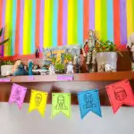 Free Printable DIY Star Wars banner for a Star Wars Birthday Party. Accessorize it with Star Wars dolls and figures and lightsaber-colored crepe paper