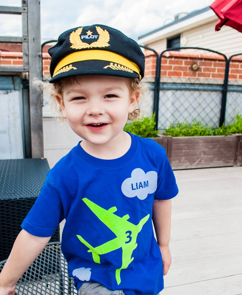 Kid's airplane birthday t-shirt personalized with name and age. Make your own iron-on airplane birthday t-shirt, or order this design online on your choice of t-shirt. Great for a modern airplane birthday party! #airplanebirthday #birthday #t-shirt #birthdayparty #kids
