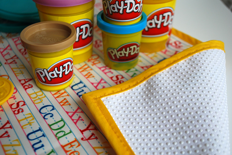 How to make a kid's DIY non-slip fabric Play-doh mat or coloring mat - free sewing pattern and instructions. Great kids DIY gift!