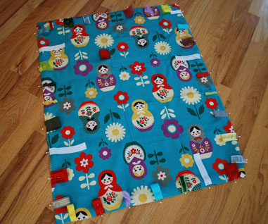 Merriment :: Kid's Travel Toy Blanket with Velcro Loops and Ribbon Tags free DIY tutorial and pattern template craft project for Merriment Design by Kathy Beymer at MerrimentDesign.com