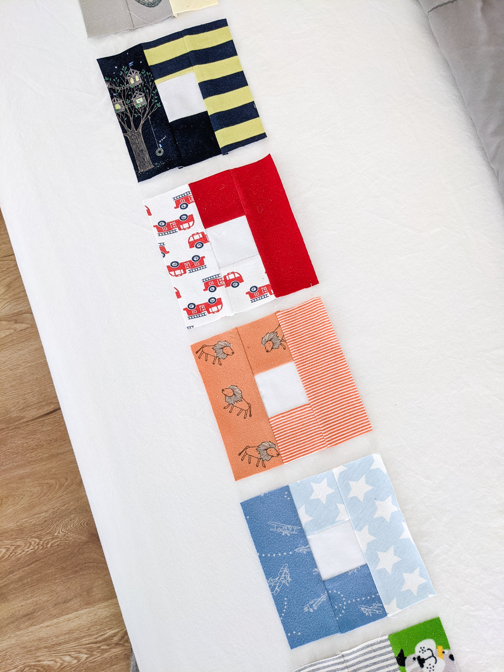 Double letter L-shaped quilt blocks from baby clothes