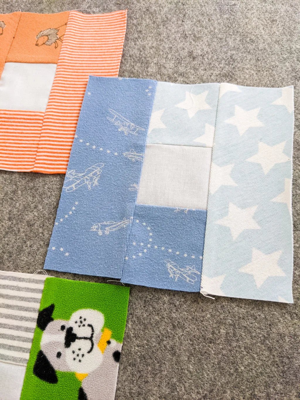 Double letter L-quilt blocks from baby clothes