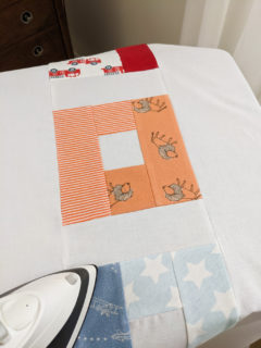 DIY baby clothes quilt pattern using L quilt blocks