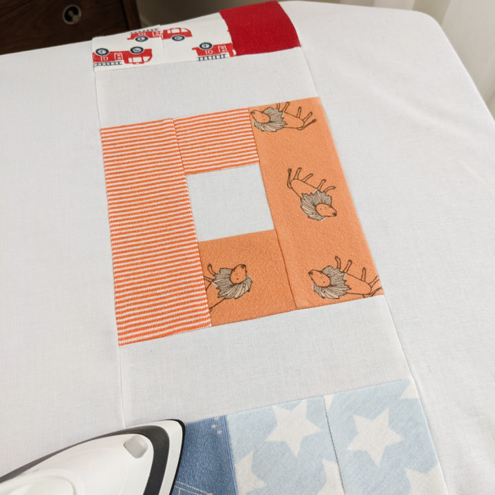 DIY baby clothes quilt pattern using L quilt blocks