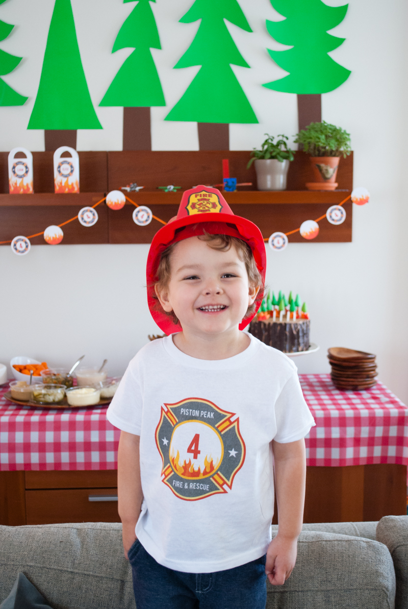 Make a DIY personalized fireman iron-on t-shirt for a firefighter birthday party or Fire & Rescue birthday party t-shirt. You can make it in less than 30 minutes!