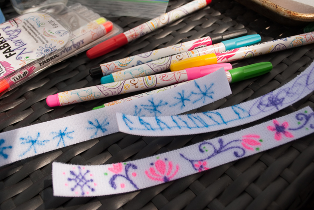 DIY Frozen charm bracelets. Great kid's activity for a Frozen birthday party or a Frozen Halloween costume idea